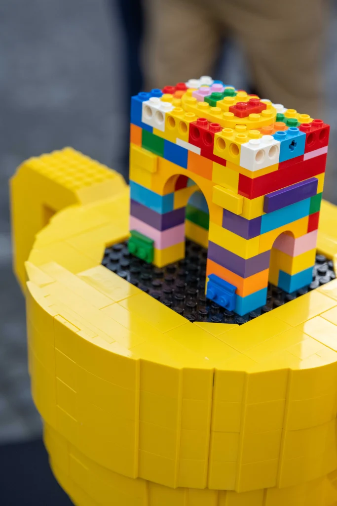 Close-up of the top of the LEGO trophy created for the winners of the Grand Tournoi des Champs in Paris, which features a replica of the Arc de Triomphe