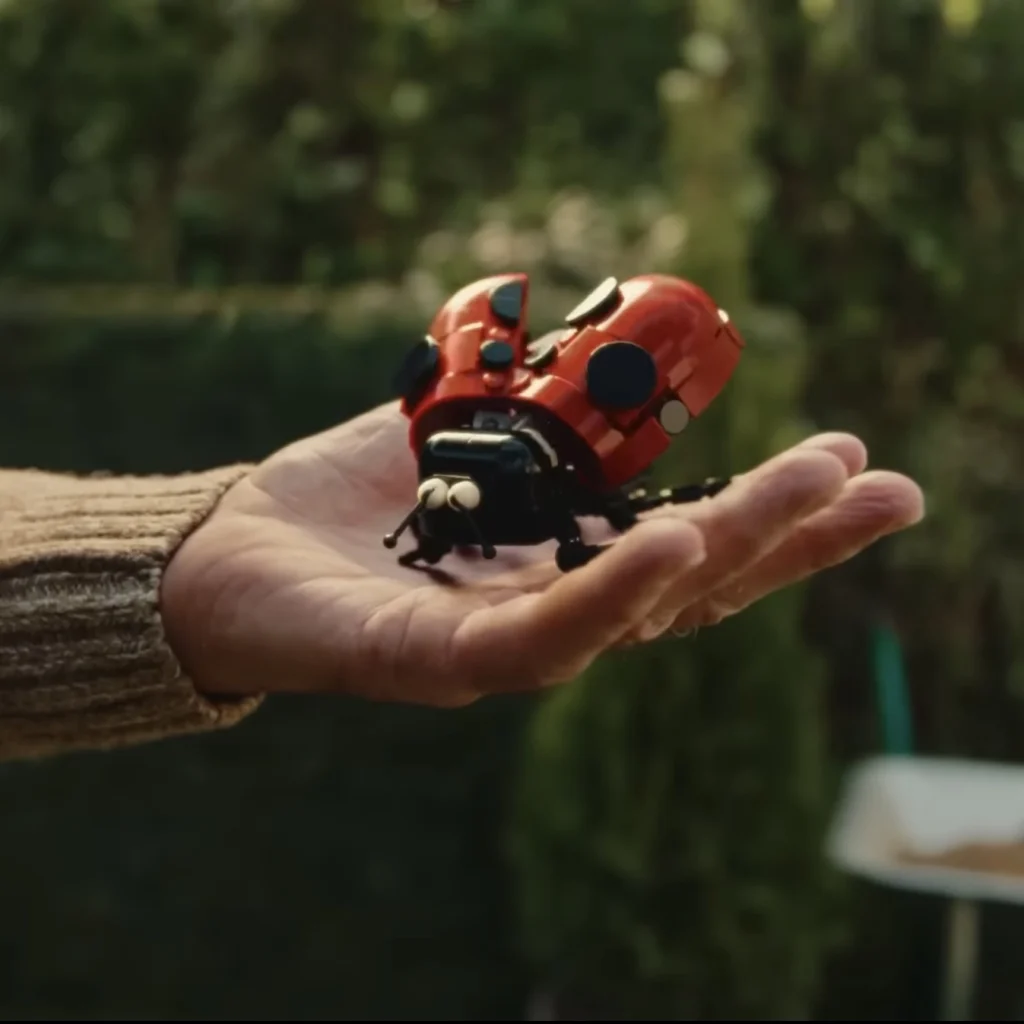 A LEGO-built, articulated ladybug perched on Tom Holland's hand in the TV commercial for which it was designed.