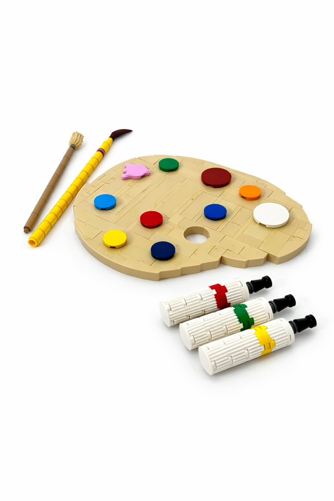 Réplica de pequeño formato de pinceles, tubos de pintura y paleta de pintor construidas con LEGO