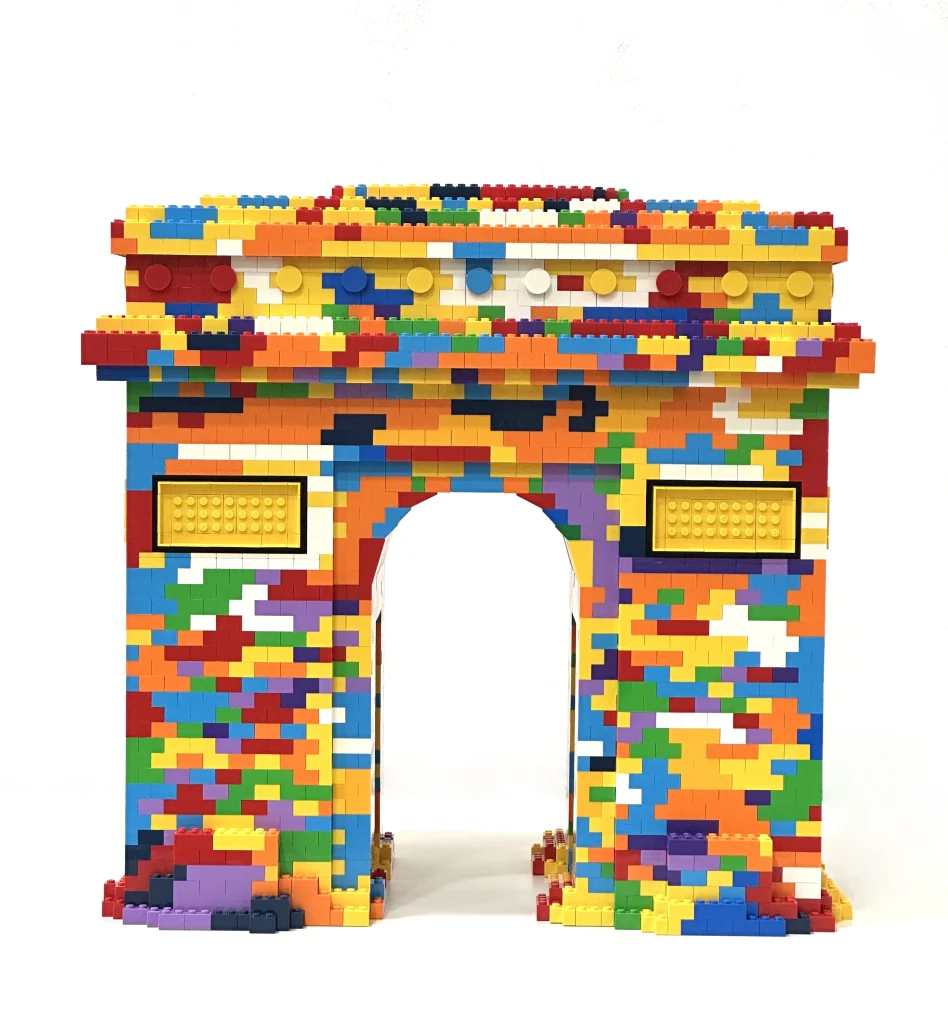 Front view of a colorful replica of the Arc de Triomphe made with LEGO