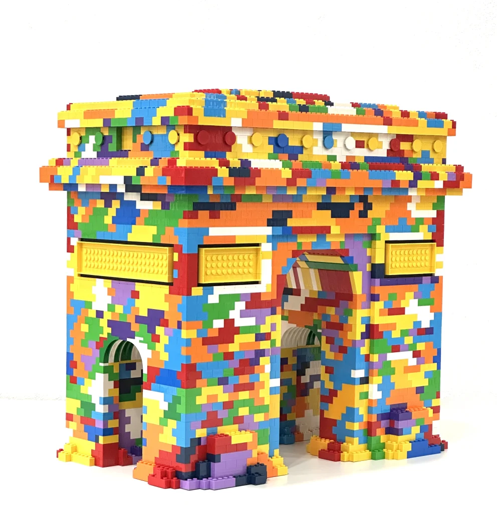 Left side view of a colorful replica of the Arc de Triomphe made with LEGO 